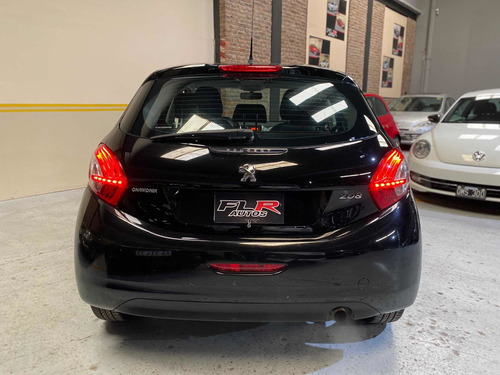 Imagen 10 de 13 de Peugeot 208 1.5 Allure 2013