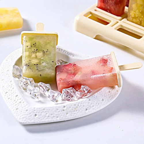 Juego De 9 Moldes Para Paletas Helado Con Bandeja Amarilla -
