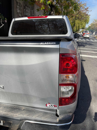 Lomo Cubre Porton Nissan Frontier