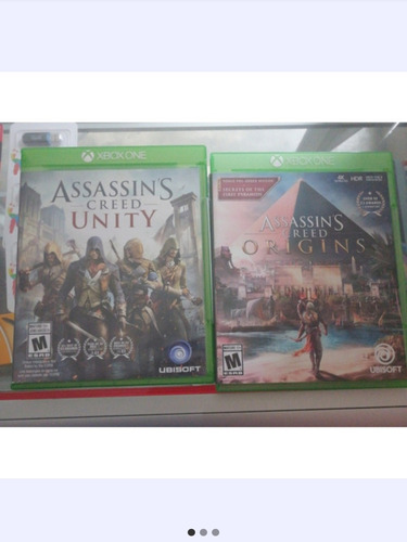 Juego Gta V Y Assassins Creed Xbox One FĂsicos (Usado)