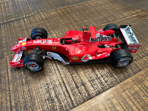 1/18 Ferrari F1 2004 Michael Schumacher 2004 Marlboro Leer Rojo (Reacondicionado)