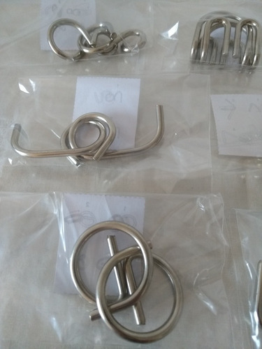 Imagem 2 de 4 de Kit Quebra Cabeça Metal 3d Enigma Com 8 Peças Steel Puzzles