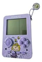 Comprar Mini Consola Juegos Electrónicos Snoopy Peanuts 8x11cm Sally