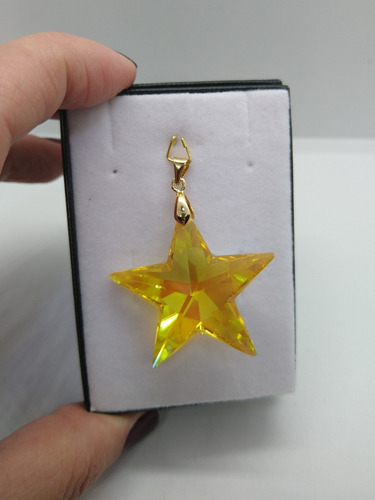 Imagem 2 de 2 de Pingente Estrela Swarovski Light Topaz Boreal Folh. Ouro 4cm