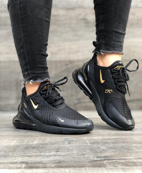 tenis nike negro con dorado para mujer