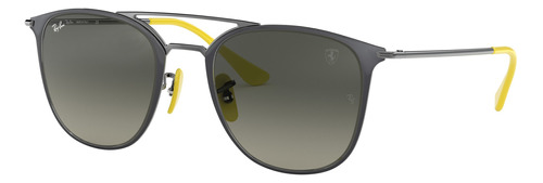 Anteojos de sol Ray-Ban Round Scuderia Ferrari Collection Standard con marco de acero color polished grey, lente grey de cristal degradada, varilla gunmetal/yellow de acero - RB3601M