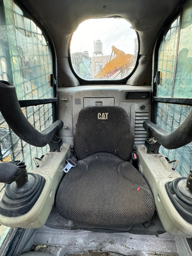 Minicargador Caterpillar 256c