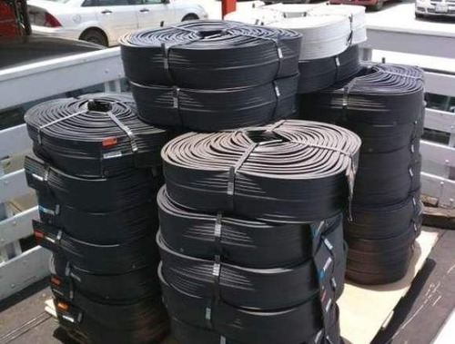 Banda De Pvc Estándar 4 Ojillada Rollo 25 Mts