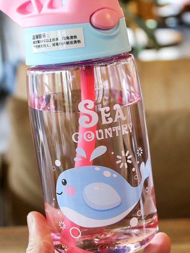 Botella de agua para niños con caño retráctil sin BPA, color rosa