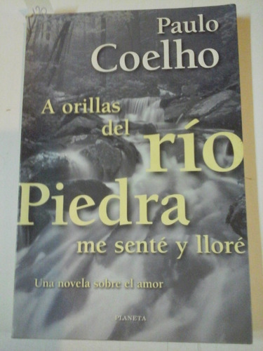 A Orillas Del Rio Piedra Me Sente Y Llore- P. Coelho- L311