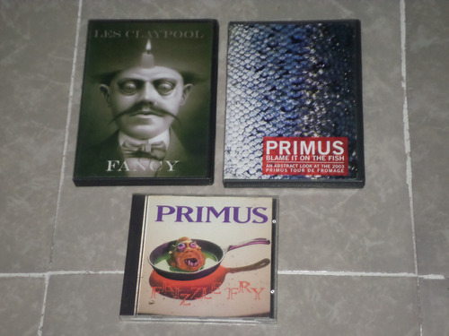 Primus - Trilogia 2 Dvd's + 1 Cd Importados Seminuevos