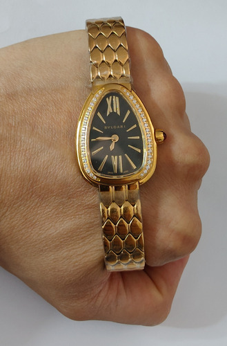 Reloj Bnlgr Mod. Serpentie Seduttorie Dama Correa Oro Amarillo Bisel Con Piedras Caratula Negra (Usado)