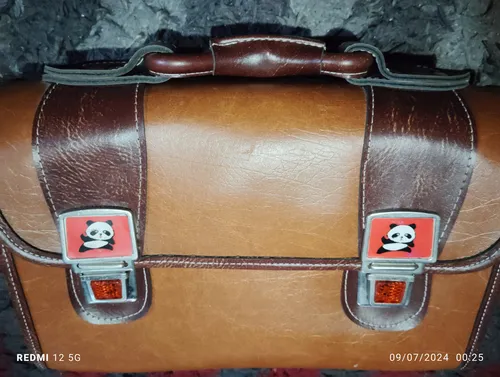 Mochila de cuero escolar antigua sale