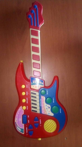 Imagen 2 de 10 de Guitarra Musical De Juguete Usada En Excelente Estado