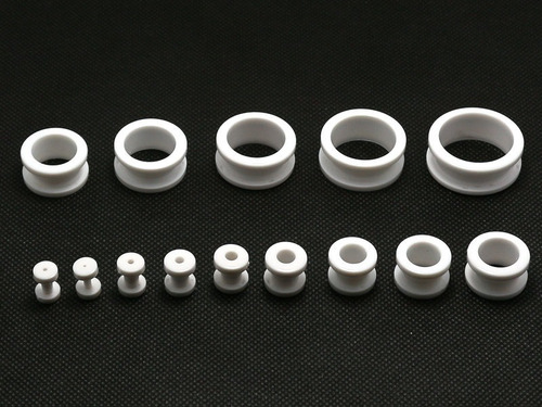 Imagen 2 de 2 de Expansores Y Cuernitos Negros Y Blancos Precio Por Unidad
