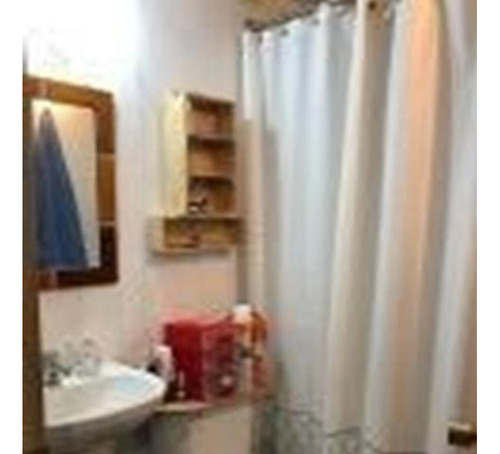 Casa Muy Bien Tenida / Cerro 18 Sur