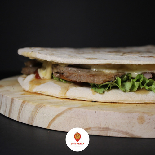Servicio De Pizzas, Calzones Y Chivitos A La Parrilla