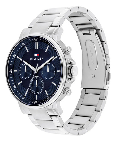 Reloj pulsera Tommy Hilfiger 1710588 con correa de acero color plateado - fondo azul