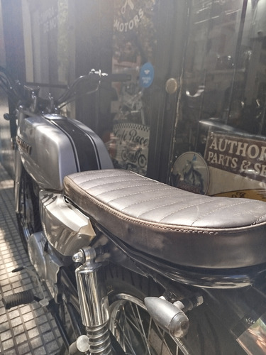 Suzuki Ax 100