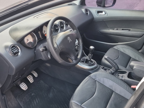 Imagen 9 de 16 de Peugeot 308 2014 2.0 Feline 143cv