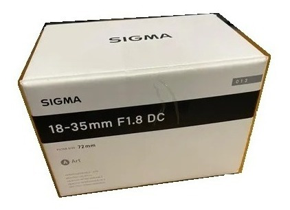 Imagem 1 de 2 de Lente Sigma For Nikon C/ Adaptador Para Sony
