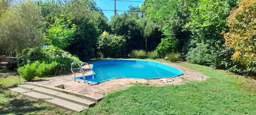 Casa En Venta Barrio La Hosteria Lujan. Pileta, Quincho Cerrado, Parrilla, Orno De Barro, Asador Y Un Hermoso Jardín.