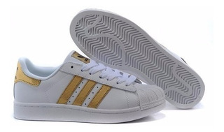 conchas adidas blancas