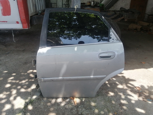 Puerta Trasera Izquierda Lado Chofer Chevrolet Optra. 