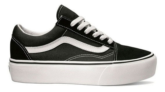 vans negras con raya blanca