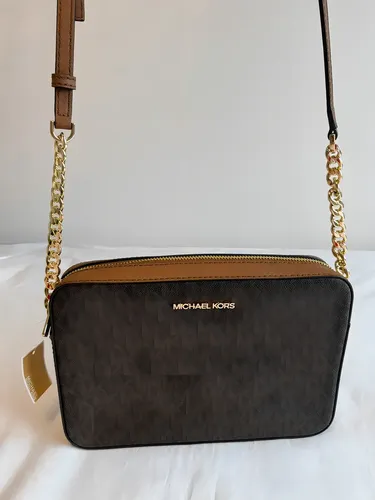 Bolsa Michael Kors Jet Set Travel Marrom | Parcelamento sem juros