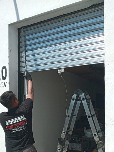 Imagen 3 de 5 de Reparación Cortina Metálica De Enrollar Emergencias 24hs