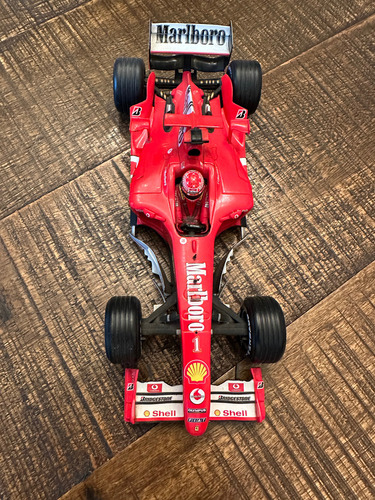 1/18 Ferrari F1 2004 Michael Schumacher 2004 Marlboro Leer Rojo (Reacondicionado)