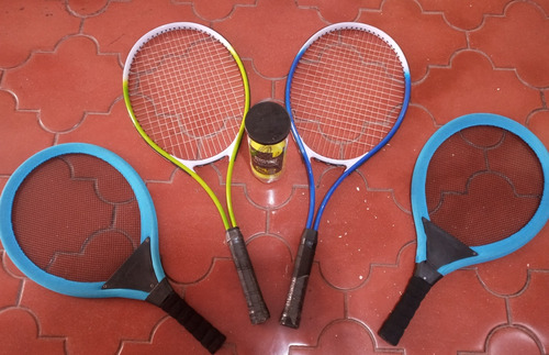 Raquetas De Tenis Y Pelotas 