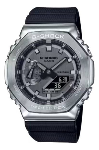 Reloj pulsera Casio G-Shock GM-2100 de cuerpo color gris, analógico-digital, fondo gris, con correa de resina color azul oscuro, agujas color gris y negro, dial gris, subesferas color gris, minutero/segundero negro, bisel color gris, luz blanco y hebilla simple