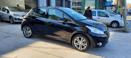 Imagen 4 de 11 de Peugeot 208 2013 1.6 Feline