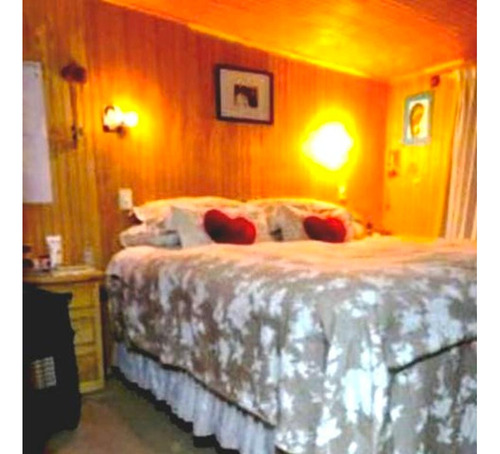 Casa Muy Bien Tenida / Cerro 18 Sur