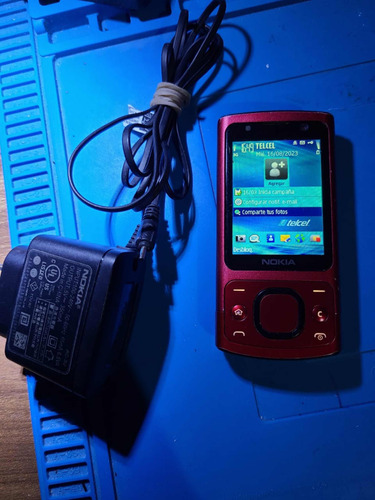 Nokia 6700 Slide Telcel Con Su Cargador Funcionando Bien
