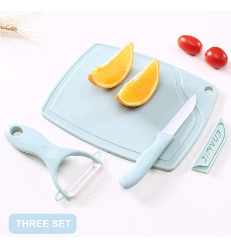 Cuchillo Y Pelador De Fruta Con Tabla De Picar
