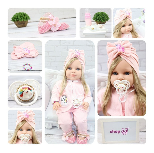 Imagem 3 de 3 de Boneca Bebê Reborn Com Cílios E Acompanha Vários Acessórios