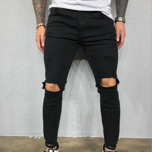 Vaqueros A La Moda Con Piernas Ajustadas Y Elásticas Rasgada