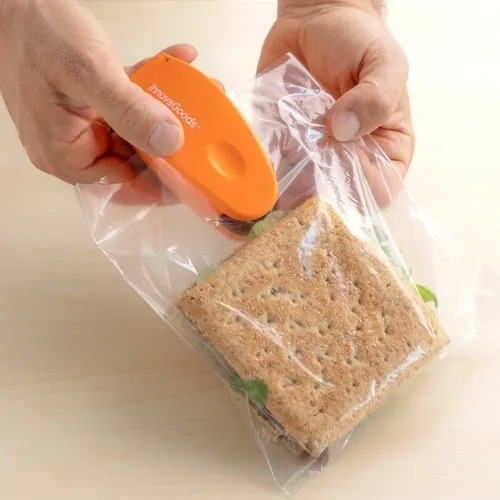 Innovagoods Mini Selladora Manual De Bolsas Con Cúter E Imán Color Naranja