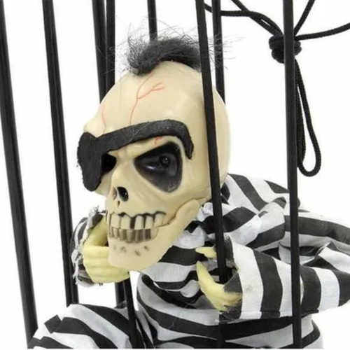 Imagem 3 de 3 de Enfeites Halloween Caveira Na Cadeia Com Luz E Movimento