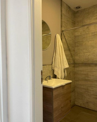 Triplex 2 Dormitorios-garage-patio-moderno