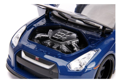 Coche Nissan con figuras de Rápido y Furioso con luz 1:18 Jada Color Azul