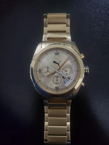 Reloj puma dorado precio store