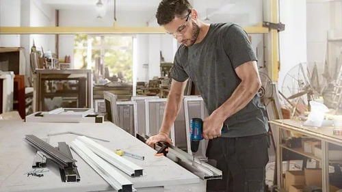 Taladro atornillador inalámbrico de 10mm Bosch GSR 120-LI 12V + 1 batería de 2Ah + accesorio con maletín de transporte 127V/220V
