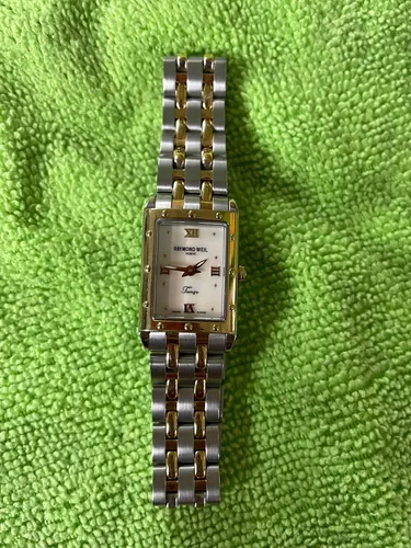 Precio de reloj raymond weil geneve hot sale