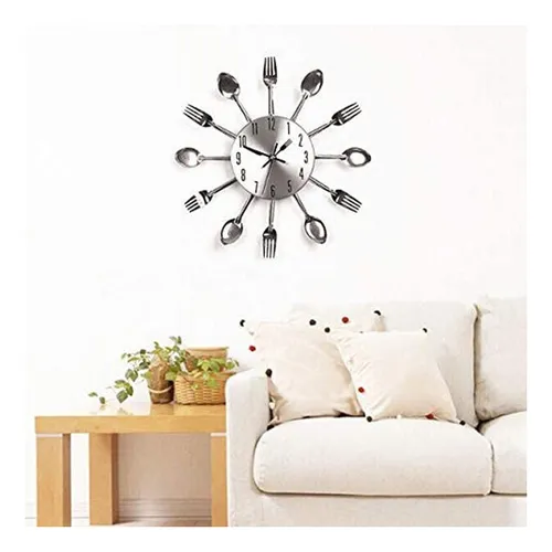 Reloj de cucharas y tenedores sale