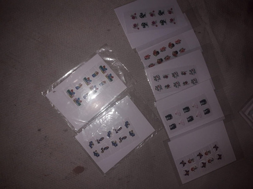 Imagem 4 de 5 de Esmalte E Adesivos De Uinha