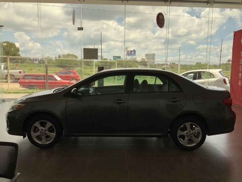 Imagen 9 de 14 de Toyota Corolla 2011 4p Xle Aut W/moonroof A/a Ee Cd R-16 Ab